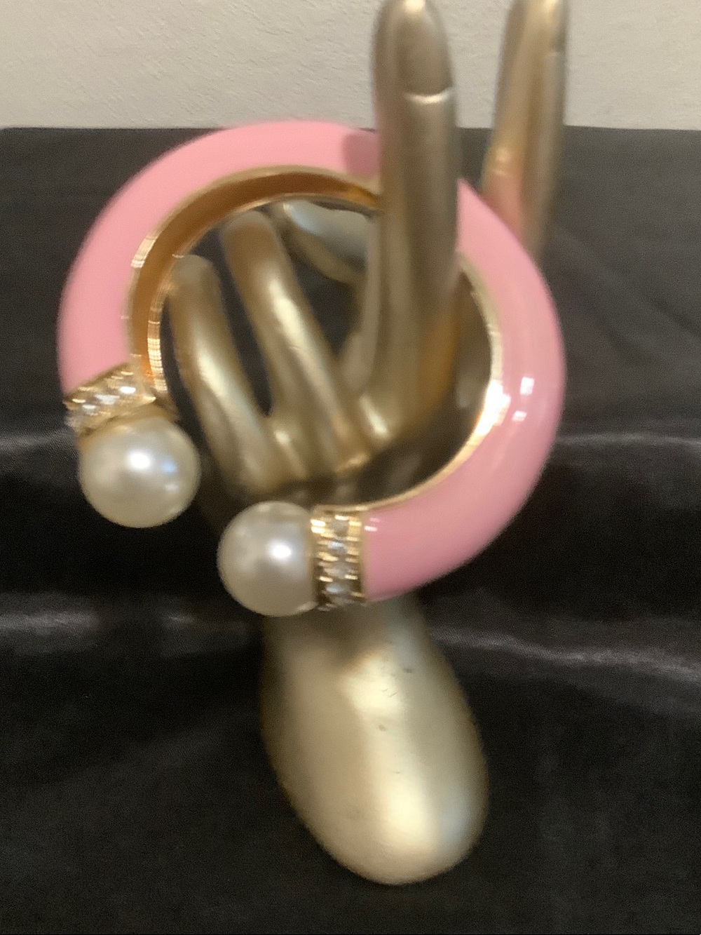 Pink Enamel enamel bracelet with pearl accents.